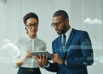 Professional photograph of a SaaS contract lawyer and a business owner reviewing a digital contract, symbolizing legal protection and strategic partnership for a SaaS business.